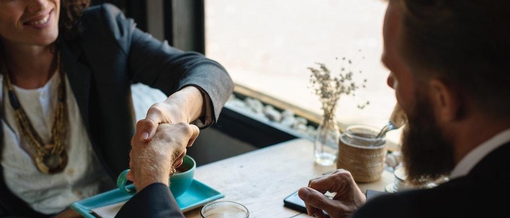 Two people shaking hands